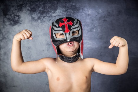 7 year old Manuel flexing in his mask as El Médico Volador